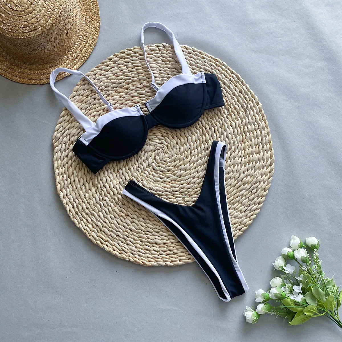 Black women's bikini briefs with a sexy pattern, made from nylon fabric.
