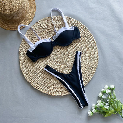 Black women's bikini briefs with a sexy pattern, made from nylon fabric.