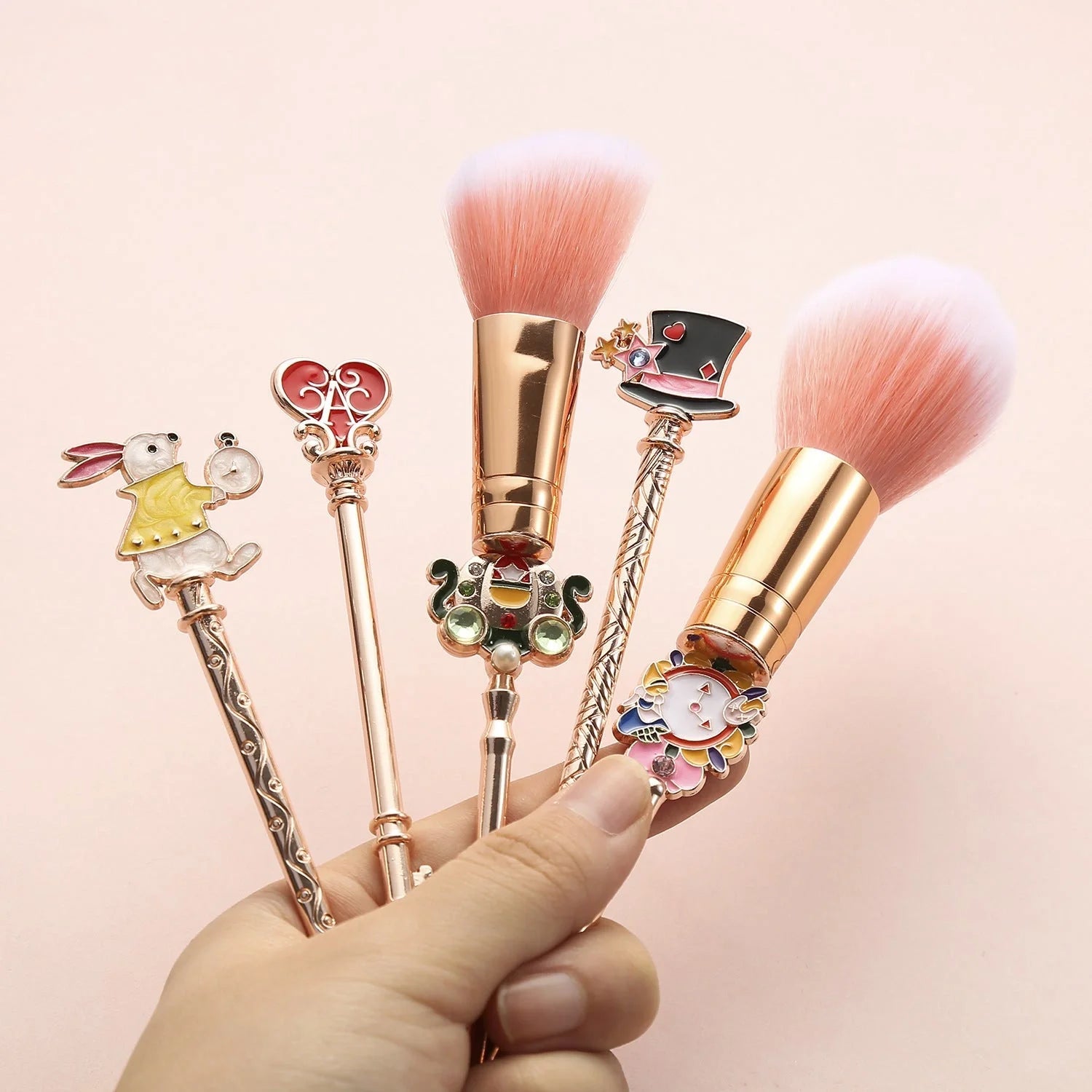 Alice makeup brush in rose gold and gold finishes for precise application