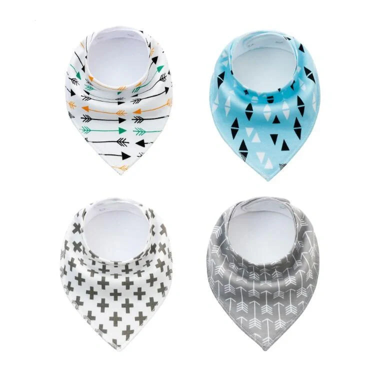 Set of four cotton baby bibs with arrow and wave designs for mess-free feeding