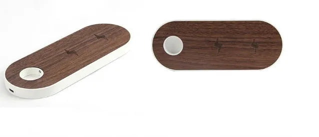Ultra-thin bamboo and wood wireless charging stand for smartphones on a desk.
