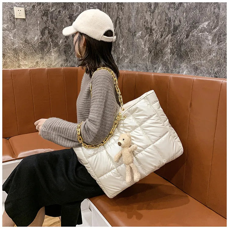 Women's large chain tote shoulder bag in black with 45cm strap, zip fastening and internal pockets