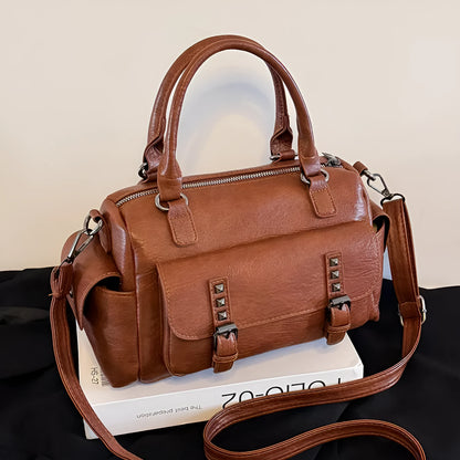 Vintage style messenger bag in PU leather with contrast stitching, horizontal square shape, shown in multiple colour options