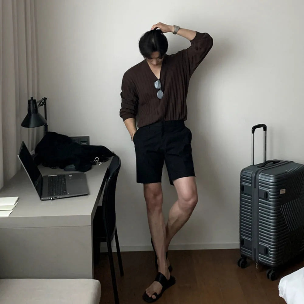 Men's loose straight casual shorts in black, khaki, and white solid colours.