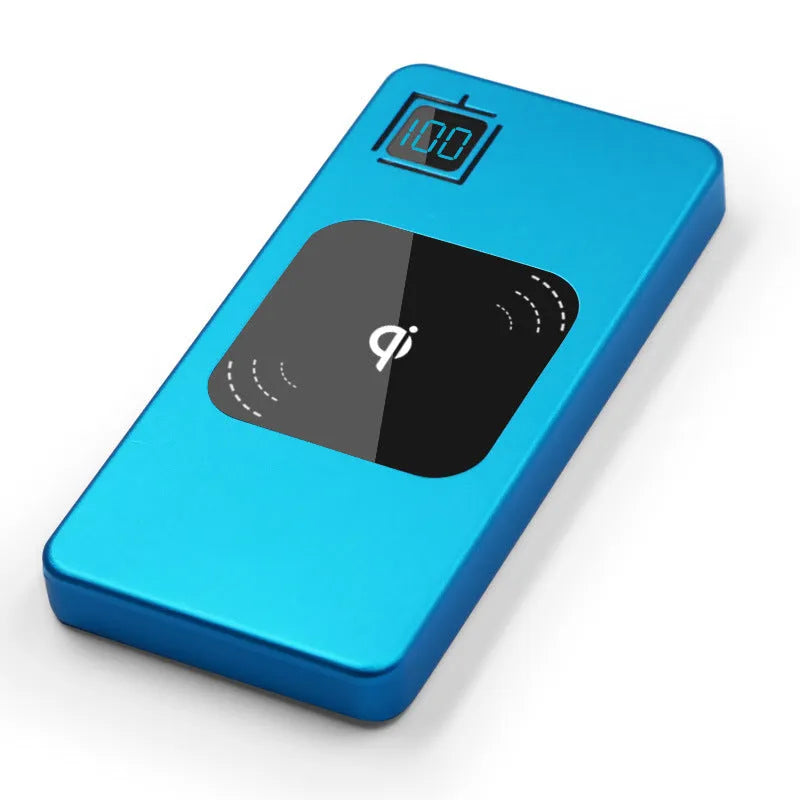 Slim black alloy power bank with LCD screen showing battery percentage, next to a smartphone.