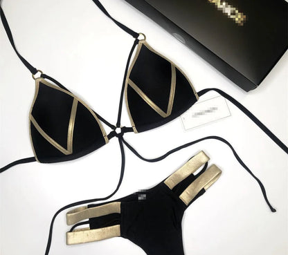 Women's bronzing bikini with padded cups in a selection of colours including black, blue, leopard print, and snakeskin print.