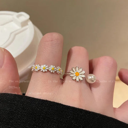 Women's copper opening sweet twin ring set showing little daisy pearl and little daisy ring designs
