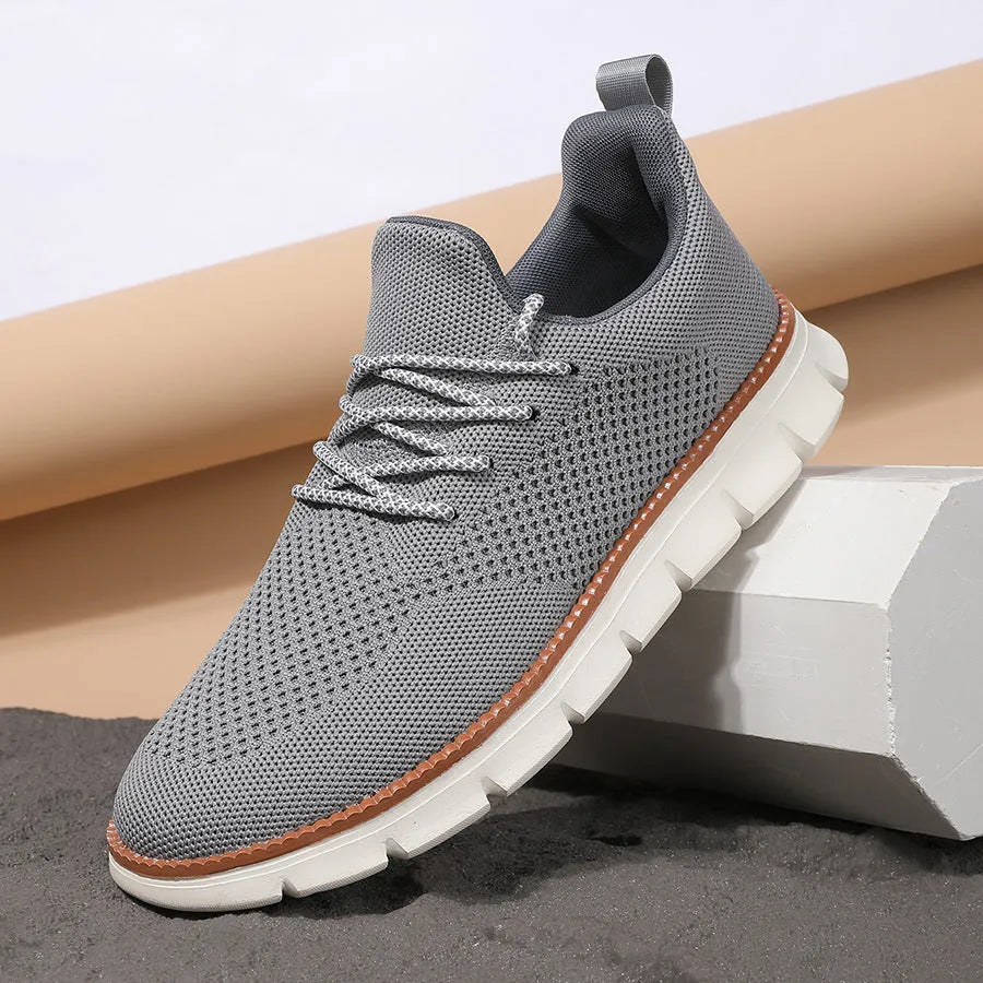 Men's grey and black low-heel casual sneaker with mesh fabric upper and round toe