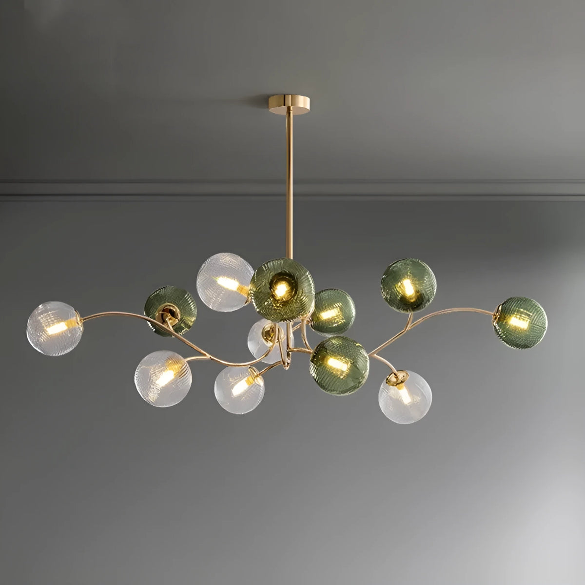 Modern Nordic-style chandelier with multiple green glass shades hanging at different heights.