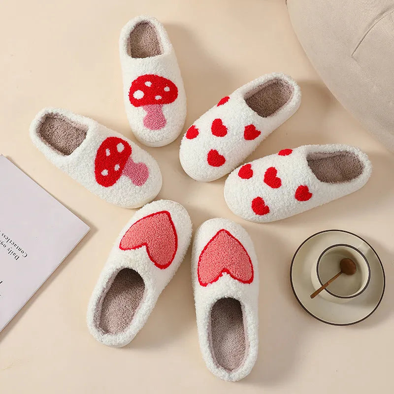 Adult women's plush home slipper in a cartoon love design with a round toe and non-slip PVC sole.