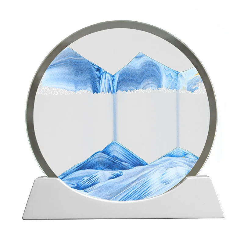 Modern abstract quicksand painting rotary night lamp in blue, 12 inches tall on a desktop.