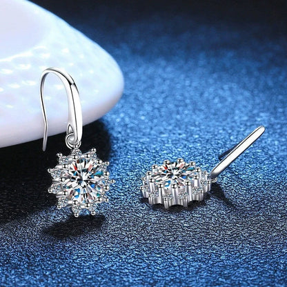 Elegant white gold sunflower stud earrings with a lustrous finish, a versatile accessory for the modern British woman