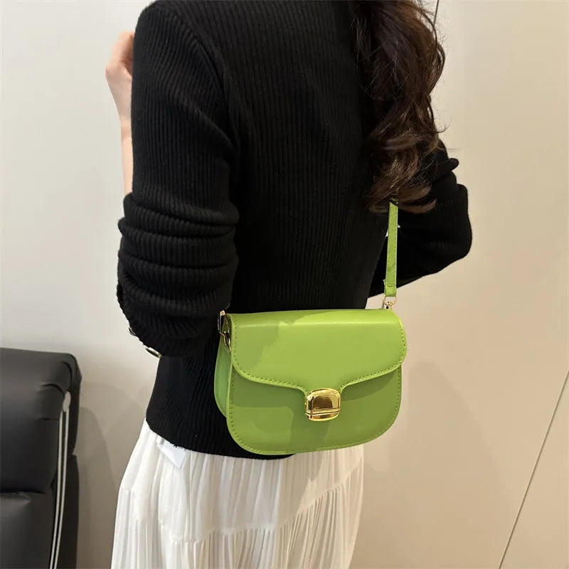 Women's PU leather handbag in khaki colour showing interior with zipper compartment and phone pocket.