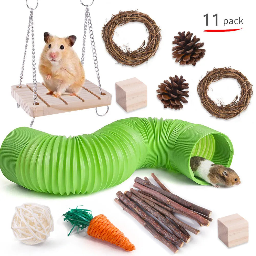 Assorted natural wooden chew toys for small pets including balls, rings, and mats on a plain background.