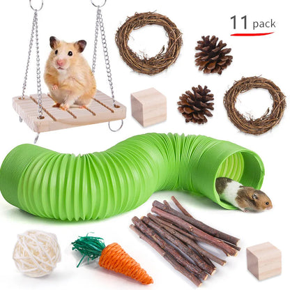 Assorted natural wooden chew toys for small pets including balls, rings, and mats on a plain background.