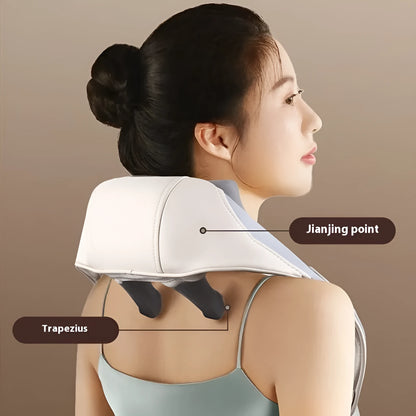 Blue foldable electric neck and back massager with rechargeable battery on a table.