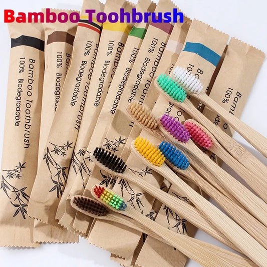 10 natural bamboo toothbrushes with charcoal bristles in six colours showing 17.5cm length
