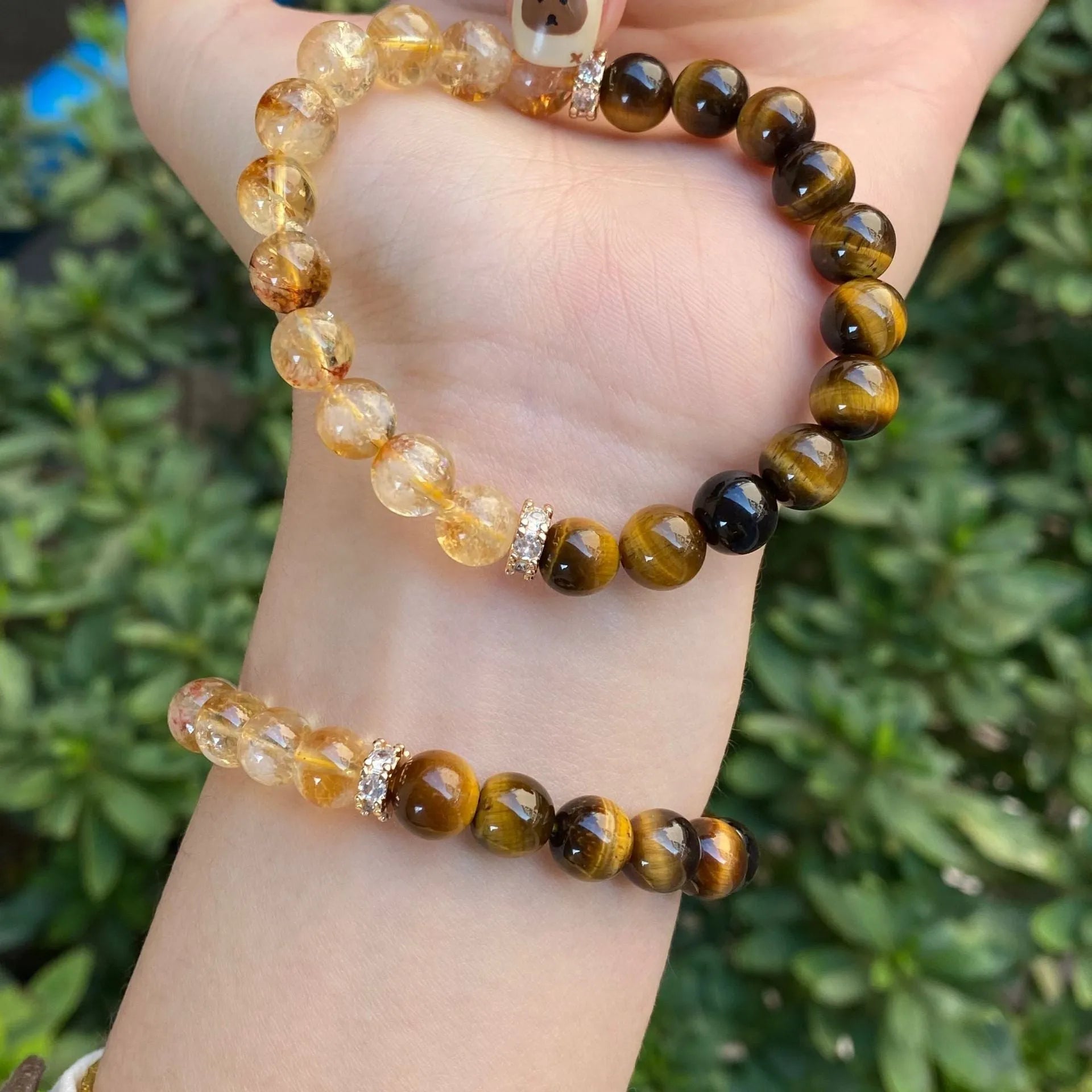 Handmade unisex crystal bracelet with a diamond gourd charm and assorted 10mm and 8mm beads.