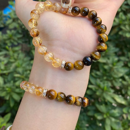 Handmade unisex crystal bracelet with a diamond gourd charm and assorted 10mm and 8mm beads.