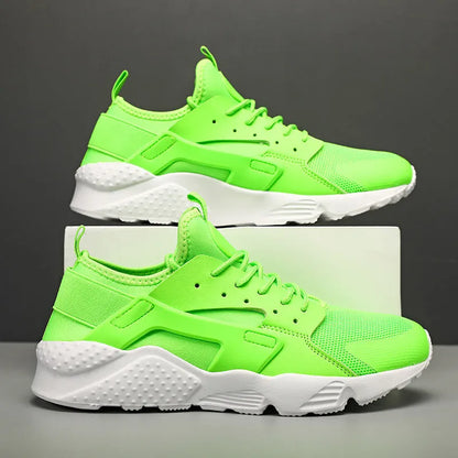 Men's low top casual shoes with mesh upper, cross shoulder straps, and flat heel in fluorescent colours