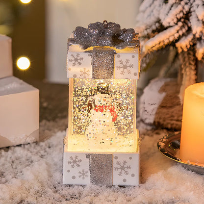 Red and white Christmas crystal ball lights with cartoon designs measuring 5.5cm