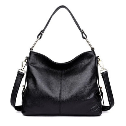 Black genuine leather vertical crossbody bag with multiple internal compartments and a sandwich pocket.