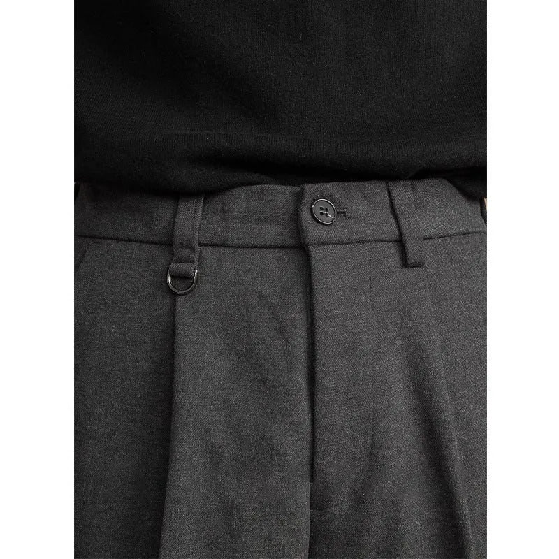 Men's straight-leg casual trousers in draped polyester fabric, shown in khaki colour on a hanger.