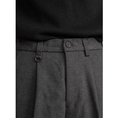 Men's straight-leg casual trousers in draped polyester fabric, shown in khaki colour on a hanger.