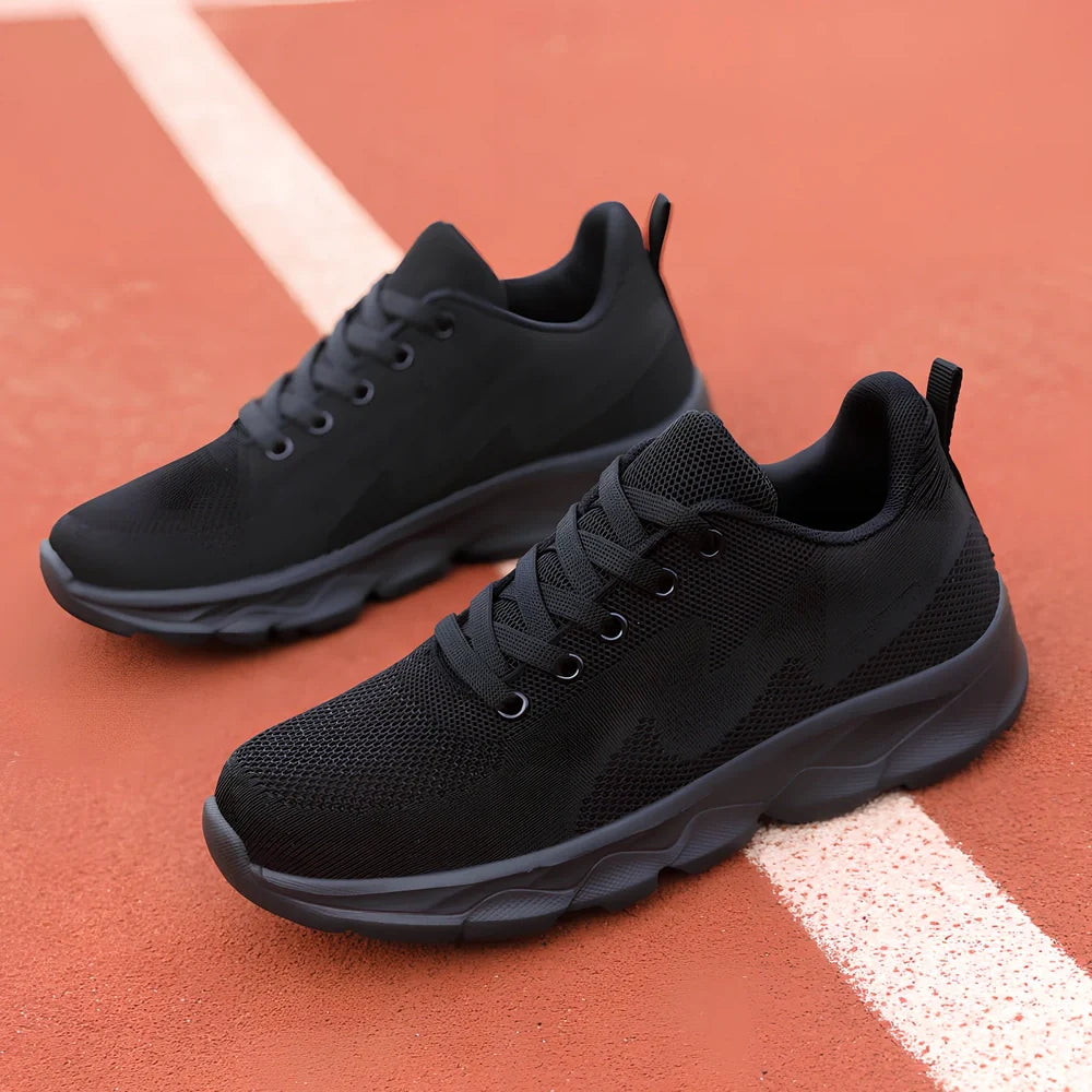 Women's black mesh running shoes with cross-strap and 3-5cm wedge heel, fabric upper with sewing details
