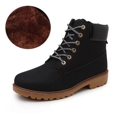 Martin boots with lace-up front, round toe and flat low heel in pink with velvet lining