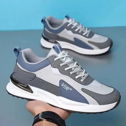 Men's colour block mesh sneakers in black, grey, and white with lace-up front and low-top design