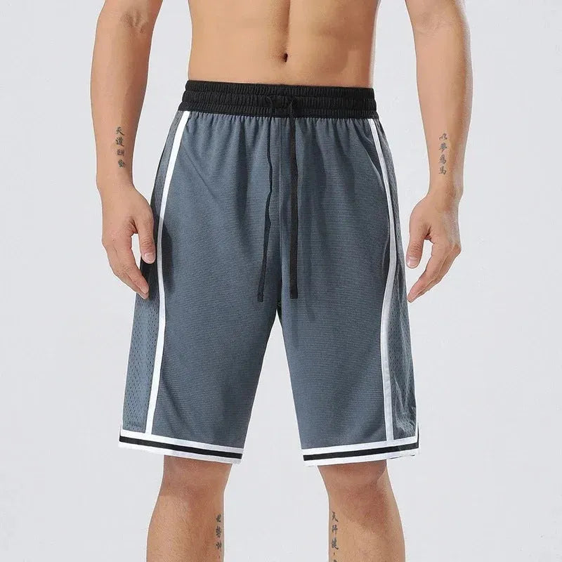 Men's straight-leg polyester sports training shorts in a grey colour, shown on a model.