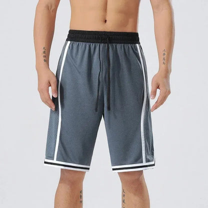 Men's straight-leg polyester sports training shorts in a grey colour, shown on a model.