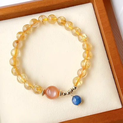 Gold rutilated quartz sunstone crystal bracelet with diamond shape and round elements for women