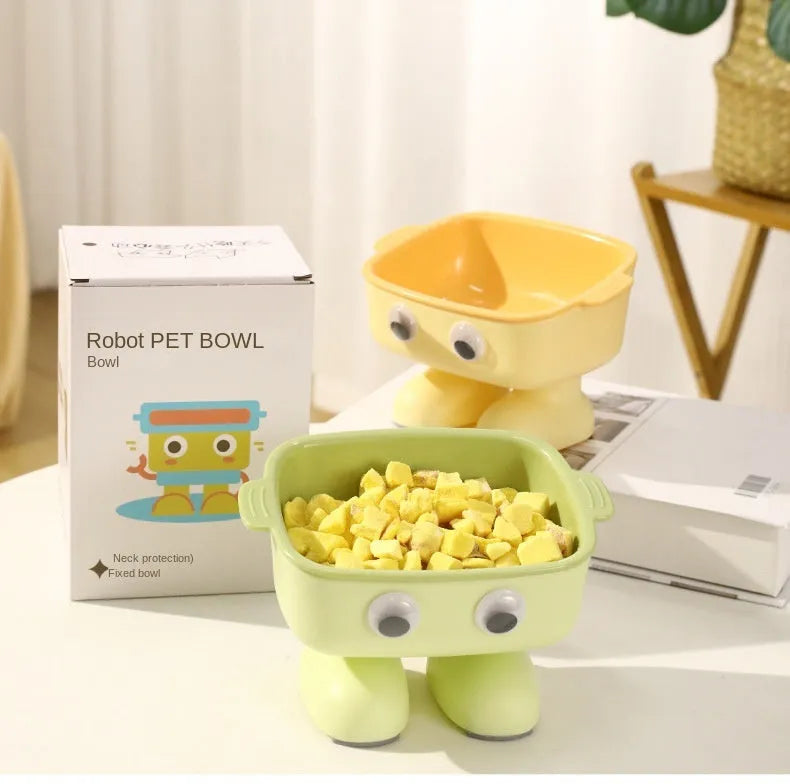 Robot-shaped elevated cat bowl with 15 degree tilt in green colour with detachable inner bowl