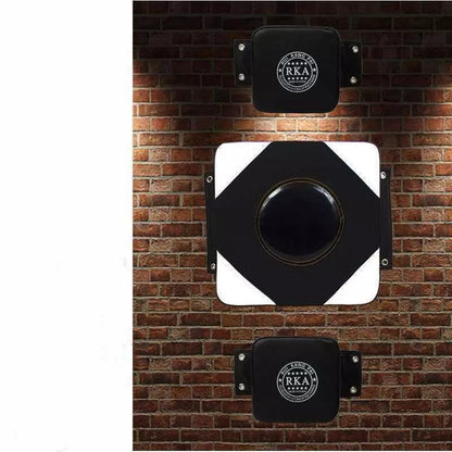 Wall hanging Thai boxing sandbag in black or orange, dimensions 30x30x10cm