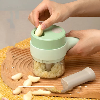 Wireless electric garlic masher and slicer combo, plastic body, 18.5cm x 13.1cm x 9.38cm, with Type-C cable and manual.