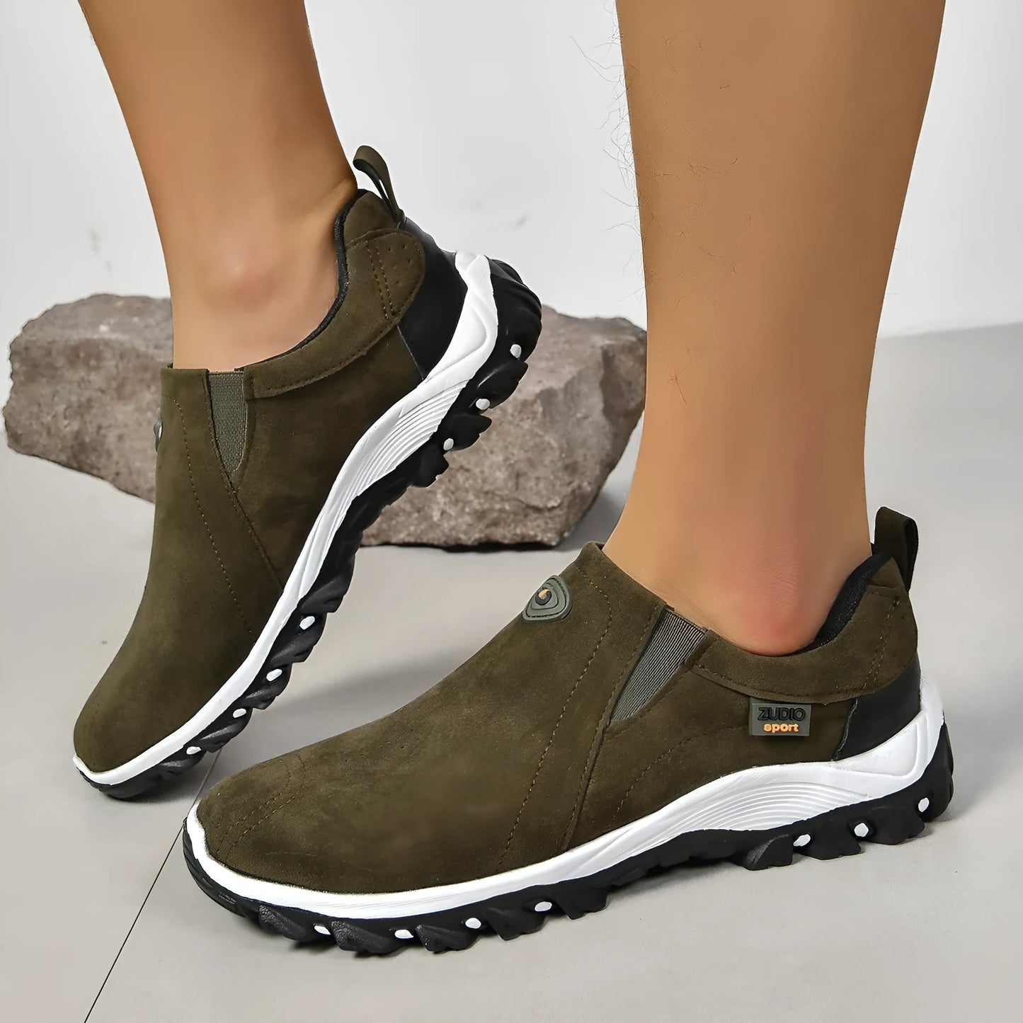 Men's grey round toe slip-on shoes with a shallow mouth on a rubber sole.