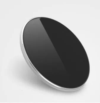 Ultra-thin aluminium wireless charger in rose gold with micro USB port and status light.