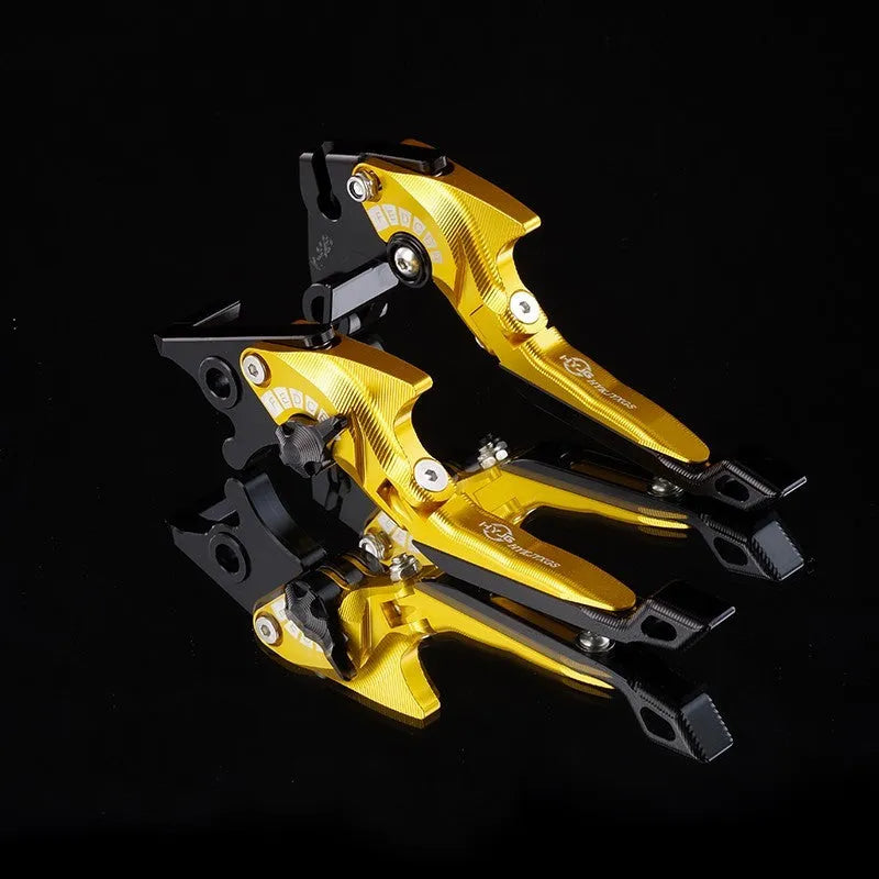Pair of anodised metal bicycle brake horn handle levers with adjustable reach, shown in a two-tone colour finish.