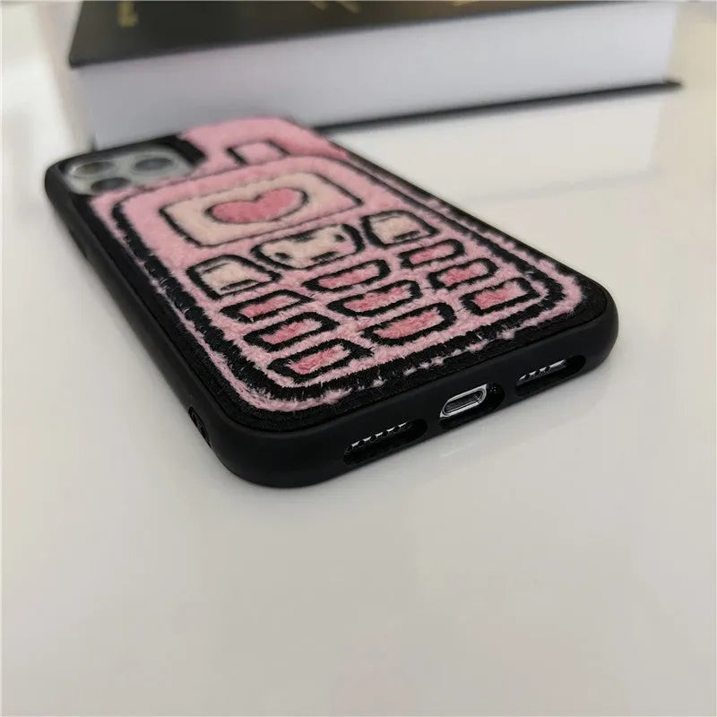 Pink iPhone back cover case with embroidered towel texture design for iPhone models X through 15 Pro Max.