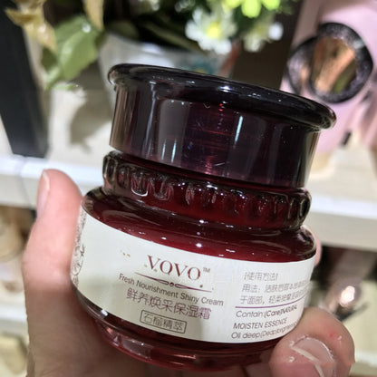 Six-piece pomegranate skin care set showing cleanser, milk, water, cream, essence, and eye cream products