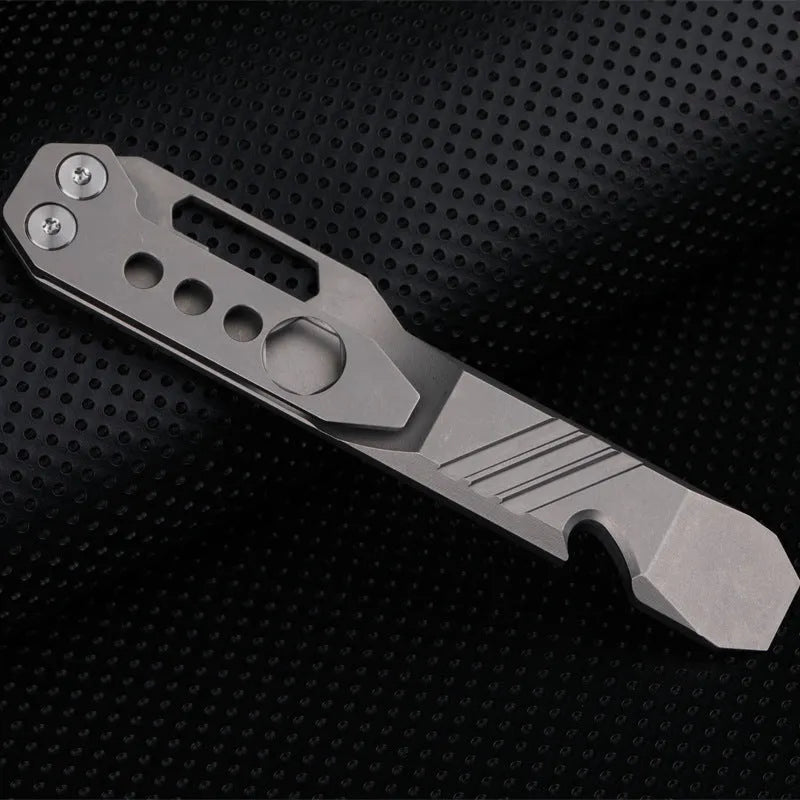 Titanium alloy multi-function crowbar tool with bottle opener on a stone wash finish background.
