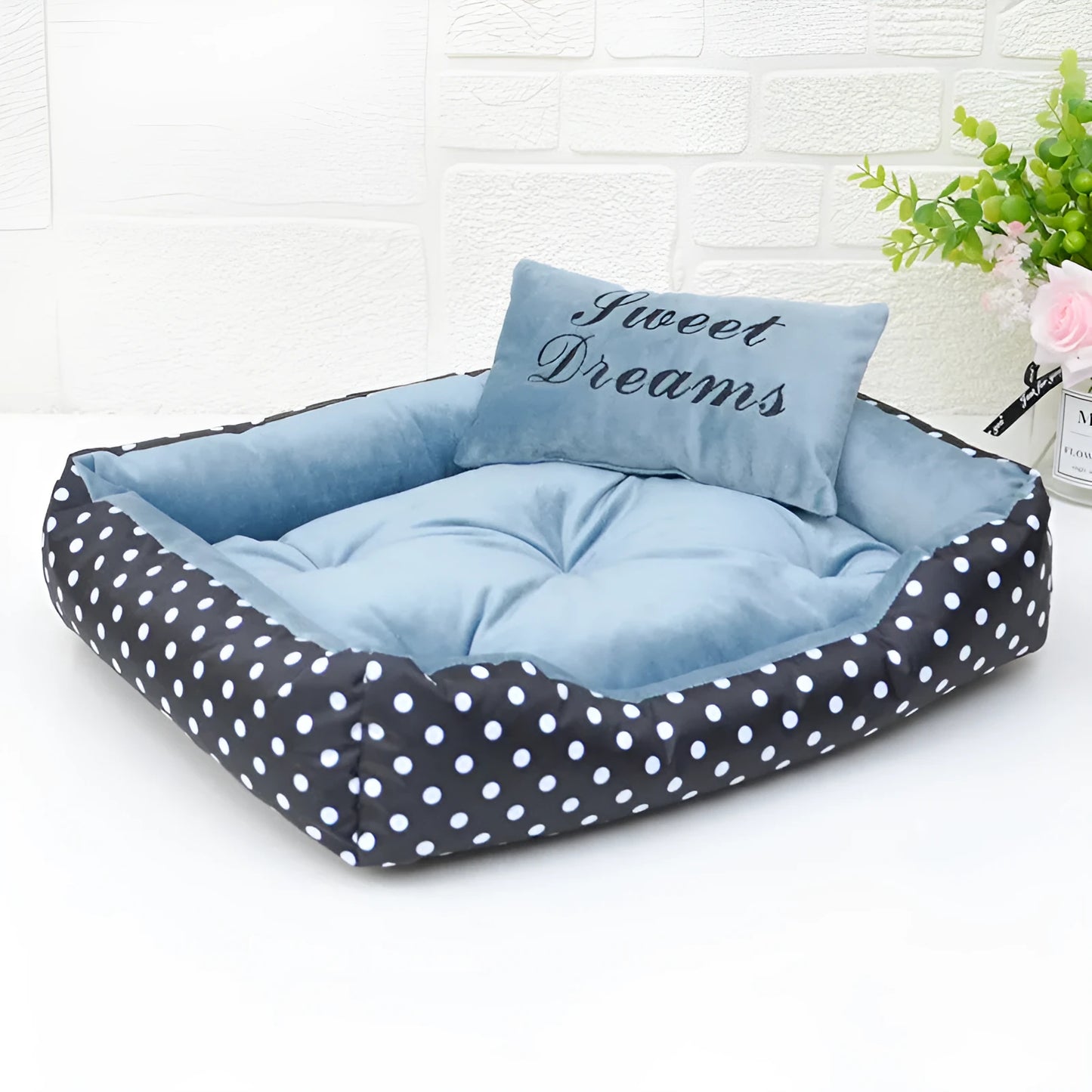 Polka dot print square nest dog bed for small dogs with a removable embroidery pillow in grey, blue, pink, or red.