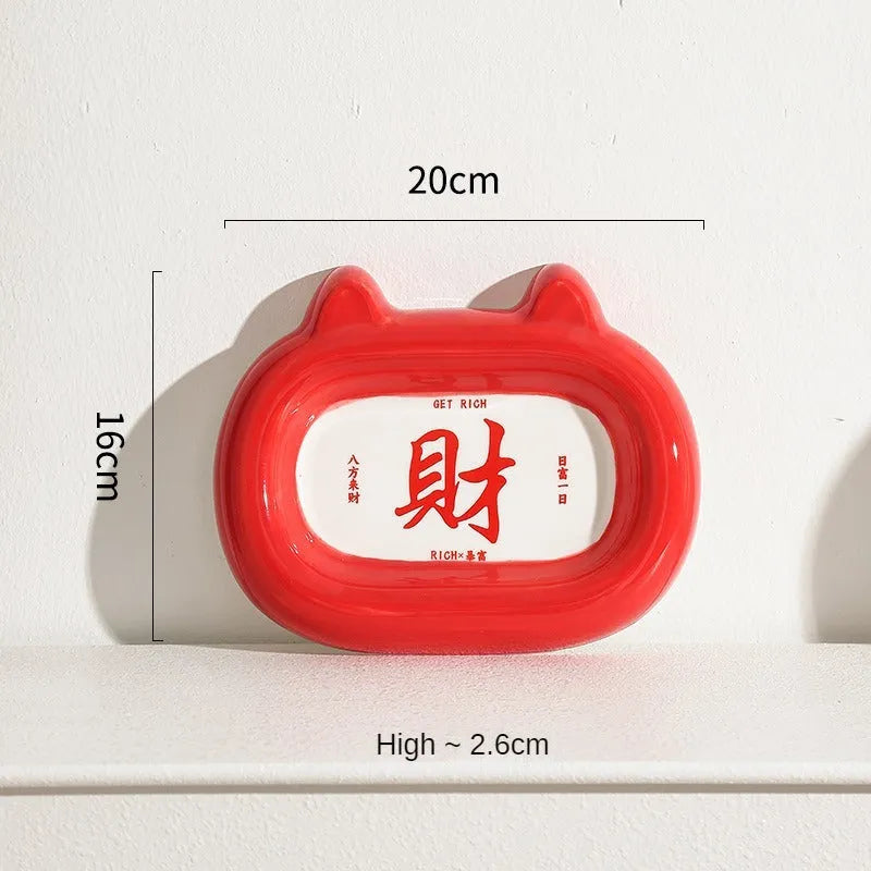 Four ceramic animal-themed pet bowls with frog, panda, pig, and fortune cat designs and silicone non-slip bases