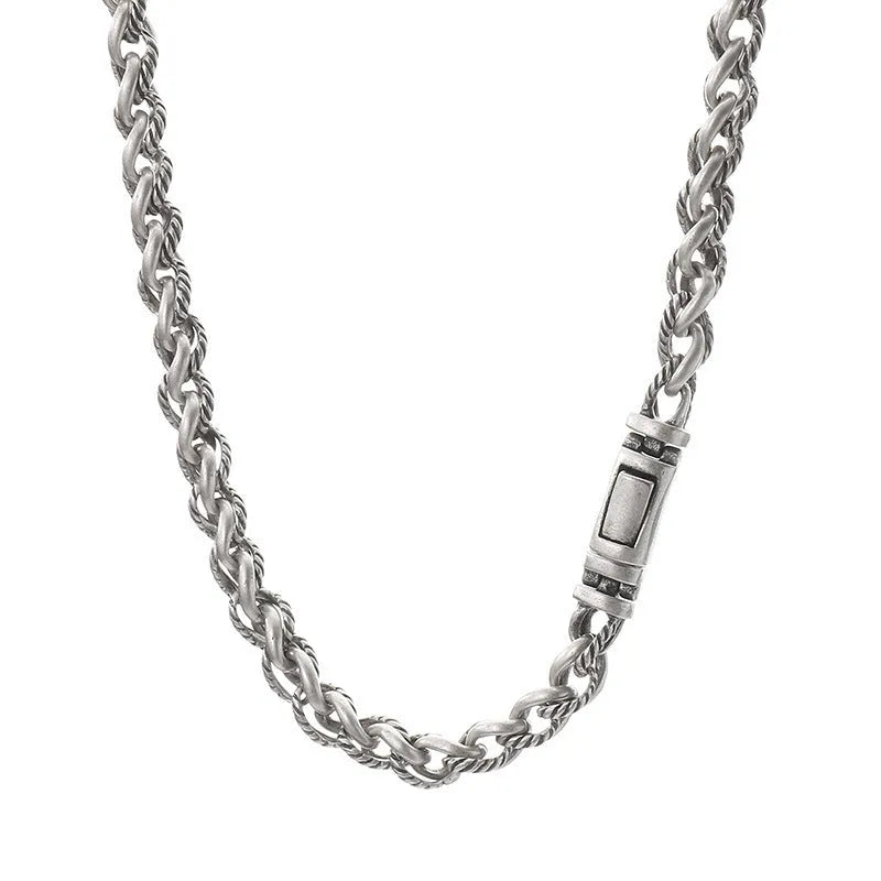 Men's antique silver titanium steel keel chain necklace with large geometric links on a black background.