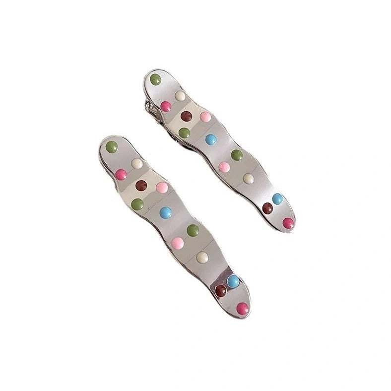 Silver metal hair barrettes with hollow heart pattern and duckbill clip design