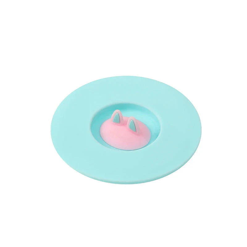 Charming cat ear silicone sealing lid in vibrant colours, designed to keep drinks fresh and prevent spills