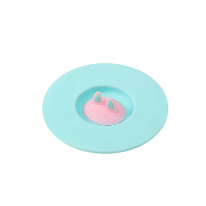 Charming cat ear silicone sealing lid in vibrant colours, designed to keep drinks fresh and prevent spills