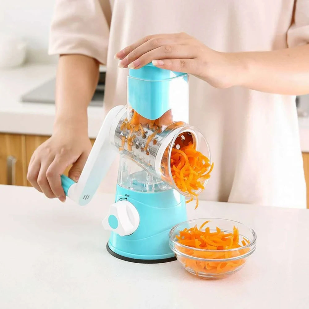 Hand drum rotary grater with stainless steel blades for vegetable preparation